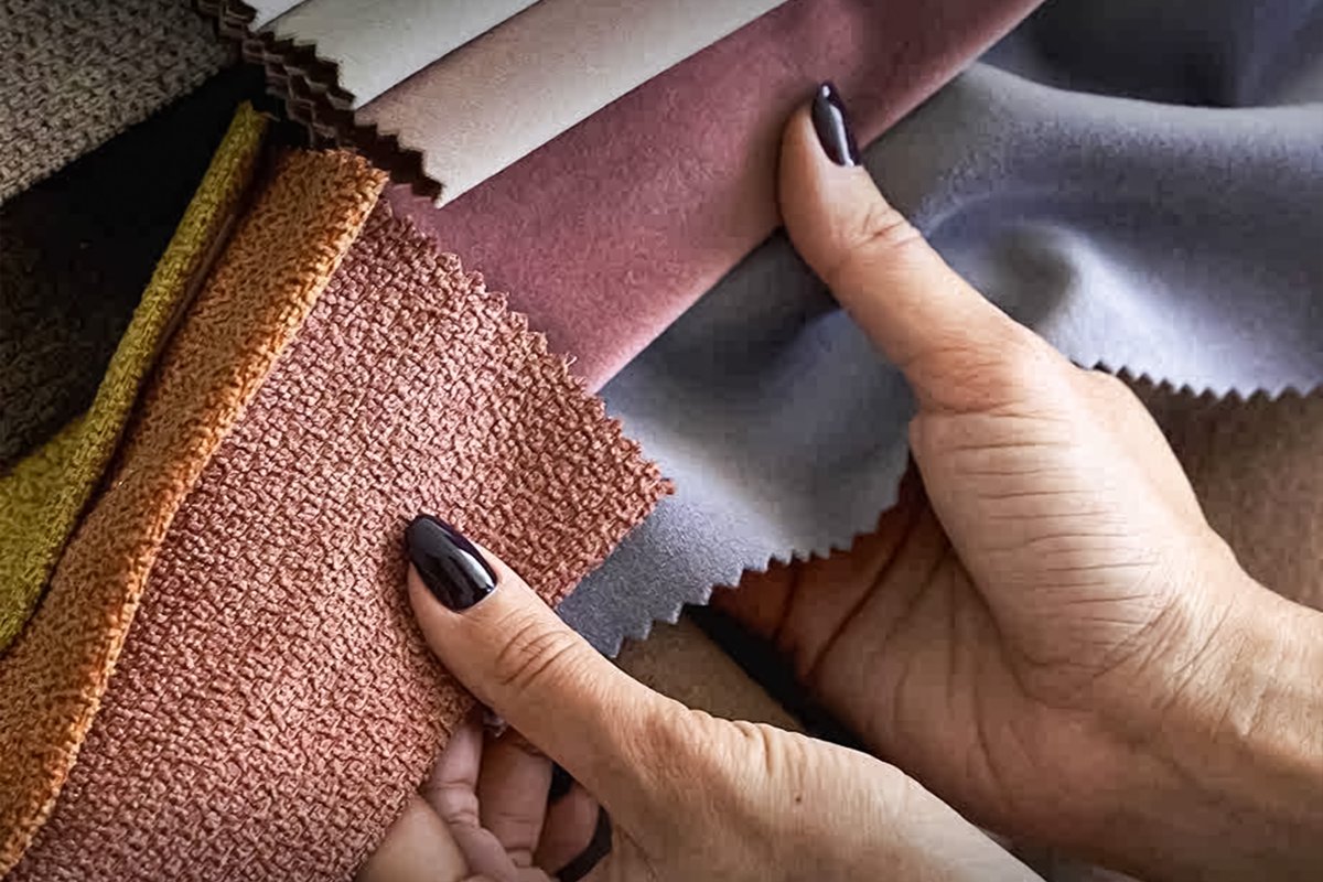 Heavyweight fabrics compared in a stack, showing visible thickness difference