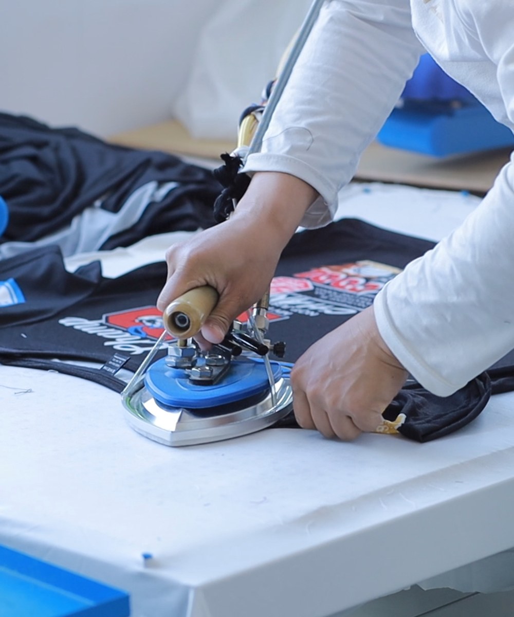 Ironing and finishing garment with heat press